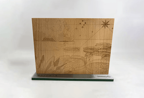 Wooden plaque with engraved design on a white background